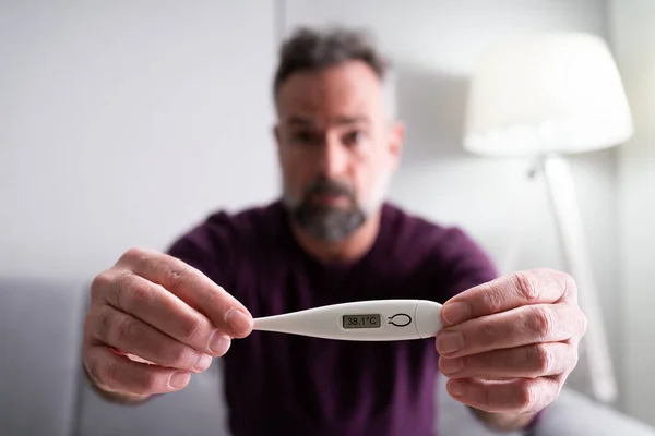 Sick Man Fever Holding Thermometer Showing High Temperature — Stock Photo, Image