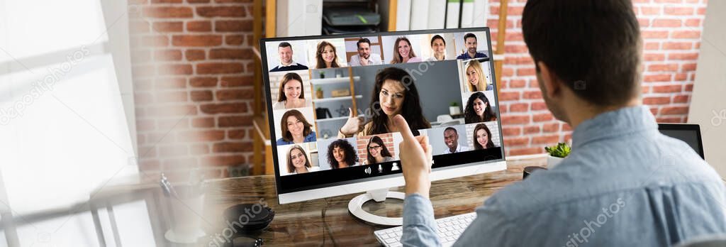 Showing Thumbs Up In Video Conferencing Webinar On Desktop Computer