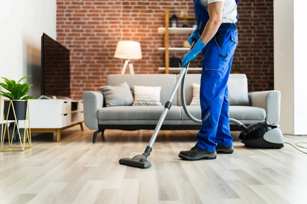 Man Uniform Vacuuming House Floor Cleaning Home — Stock Photo, Image