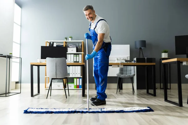Male Janitor Mopping Floor Face Mask Office — Stock Photo, Image