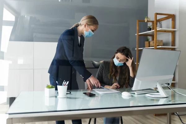 Business Employees Social Distancing With Face Mask In Office