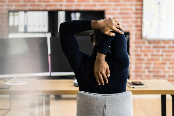 African Employee Man Doing Wellness Fitness Health Stretch Desk — Stock Photo, Image