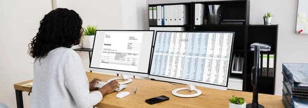 Woman Using Invoice Software Multiple Computer Screens — Stock Photo, Image
