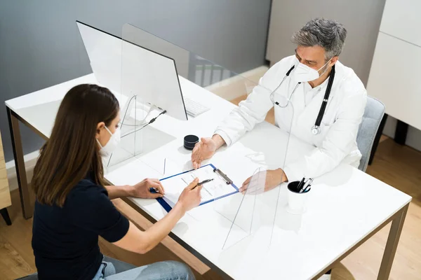 Doctor Healthcare Medical Meeting With Patient In Face Mask