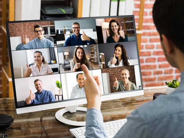 Group Of Diverse People Showing Thumbs Up In Video Conference