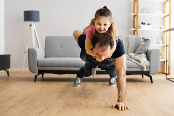Happy Family With Child Fitness Training Exercise