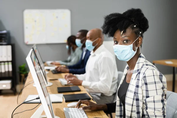 Computer Training Classroom In Office Wearing Face Mask