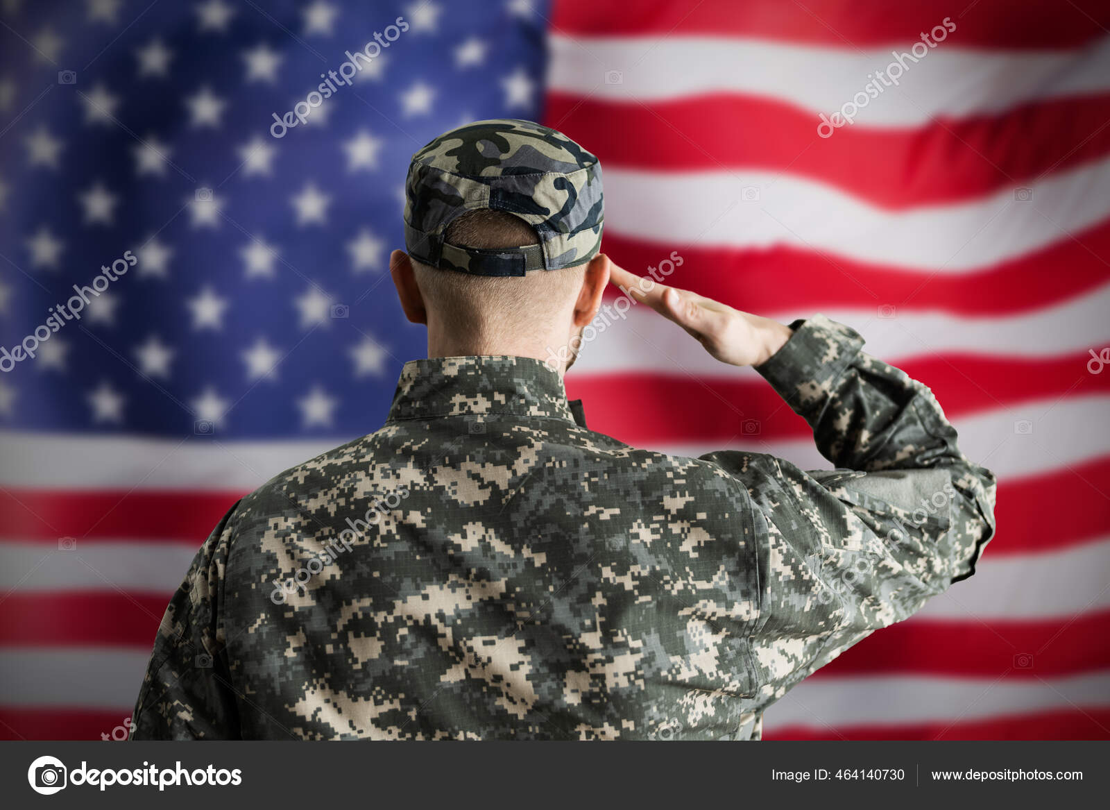 soldiers saluting the flag