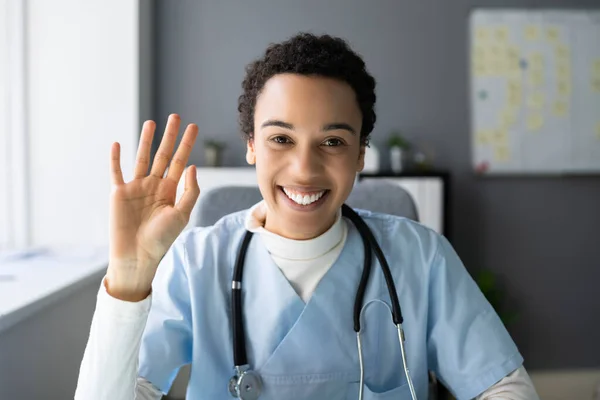 African Nurse Or Doctor Using Video Conference