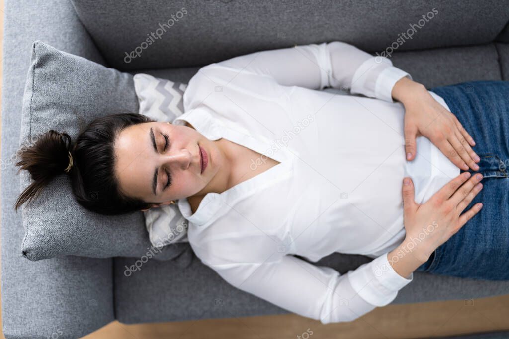 Women PMS Stomach Pain And Digestion Problem