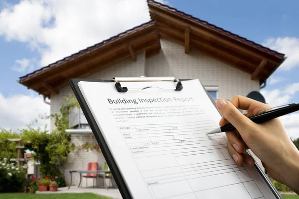 African American Inspector Checking Building Inspection Report — Stock Photo, Image