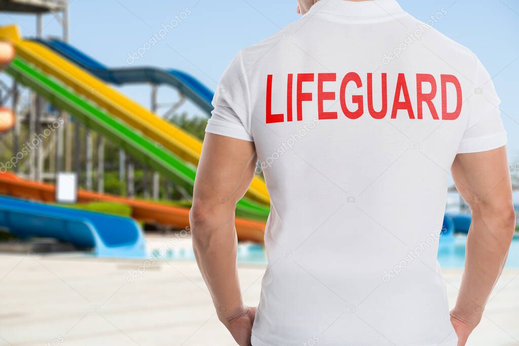 Safeguard And Sport Recreation Coach. Poolside Rescuer