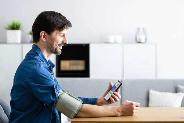 Blood Pressure Check Using Smart Monitor African Patient Man — Stock Photo, Image