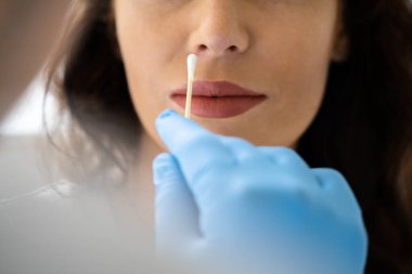 PCR Or Rapid Antigen Covid 19 Nose Swab Test clipart