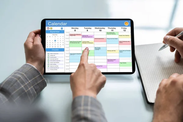 Close Businessperson Looking Calendar Digital Tablet — Stock Photo, Image