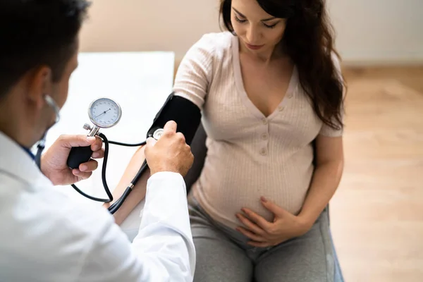 Close Male Doctor Measuring Blood Pressure Pregnant Woman Clinic — Stock Photo, Image
