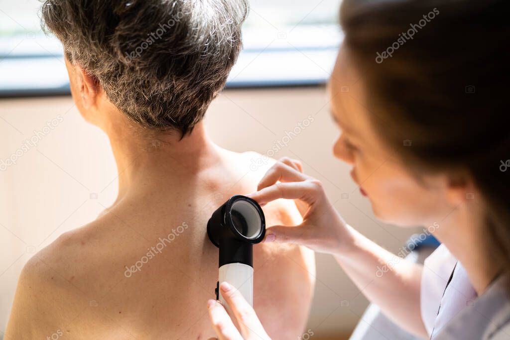Dermatologist Checking Skin Allergy And Pigment Problems