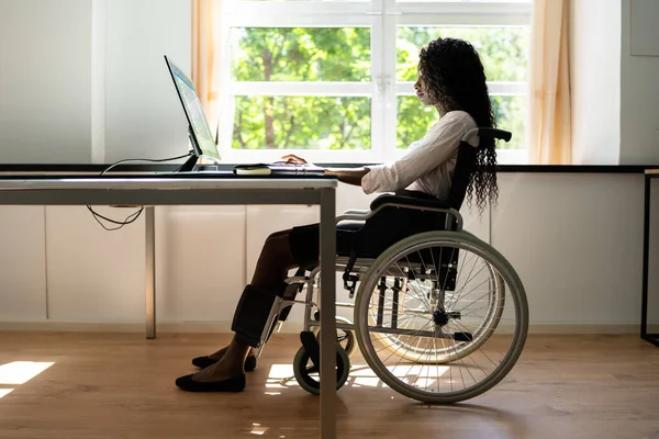 African American Black Woman Using Computer. Handicapped Worker With Disability