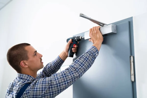 Handyman Installing Fixing Automatic Door Closer Maintenance Service — Stock Photo, Image