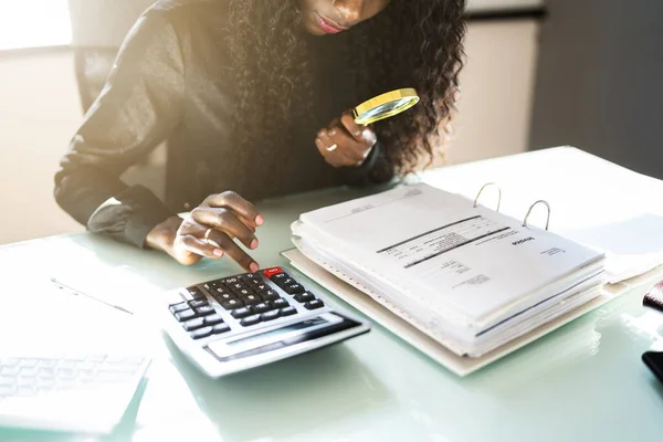 African American Corporate Tax Auditor Using Magnifying Glass — Stock Photo, Image