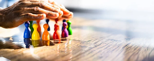 Inclusion Diversity Equality African Hands Safeguard Wooden Pawns — Stock Photo, Image