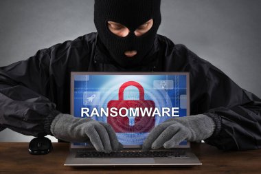 Ransomware Virus. Ransom Extortion Attack. Hacked Encrypted Laptop clipart