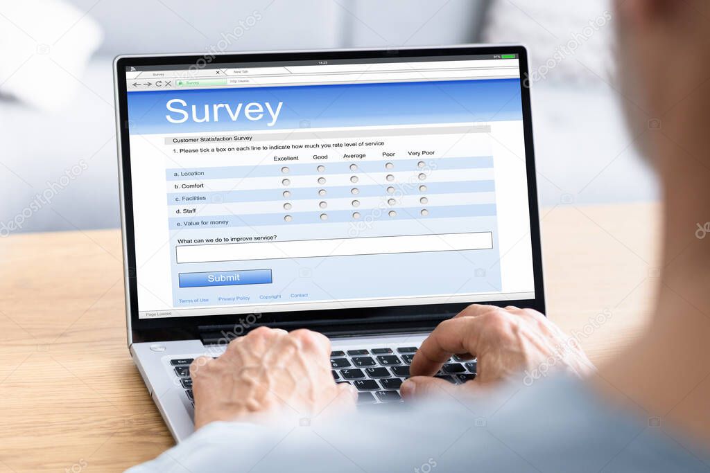 Online Feedback Or Business Survey Form On Computer