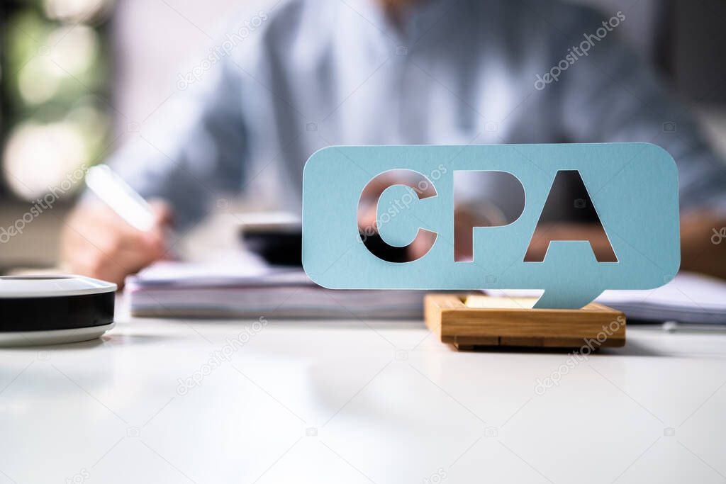 CPA Sign With The Businessman Analyzing Tax Invoice