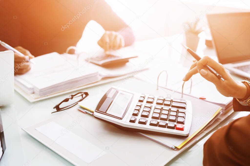 Chartered Accountants Using Calculator For Tax Invoice