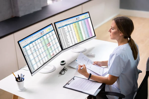 Medical Bill Codes Spreadsheet Data Business Analyst Woman — Stock Photo, Image