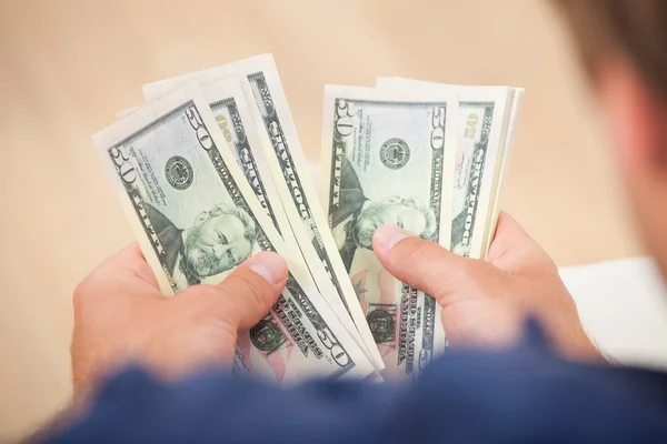 Man Counting Dollar Bills — Stock Photo, Image