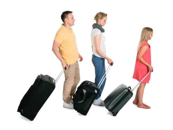 Young Family Walking With Luggage — Stock Photo, Image