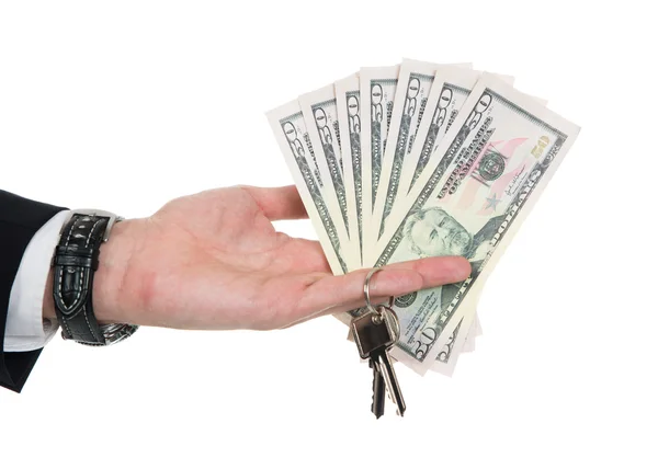 Businessman's Hand Holding Dollar Bills And Key — Stock Photo, Image