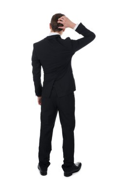 Confused Businessman Scratching His Head clipart