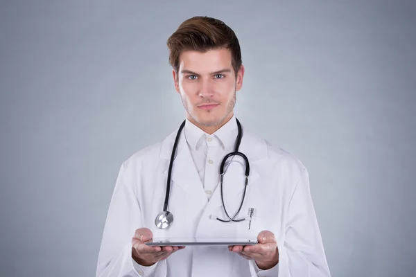 Portrait Of Confident Doctor Holding Digital Tablet — Stock Photo, Image