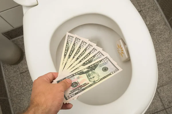 Wasting money concept — Stock Photo, Image