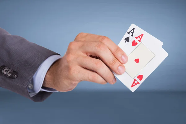 Hand holding aces cards — Stock Photo, Image