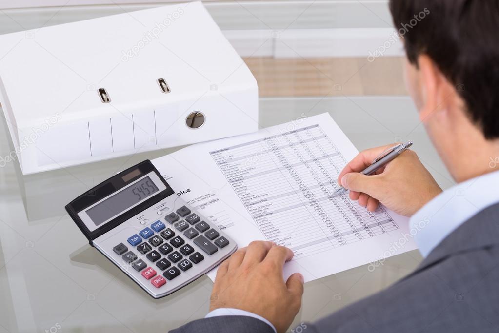 Accountant calculating finances