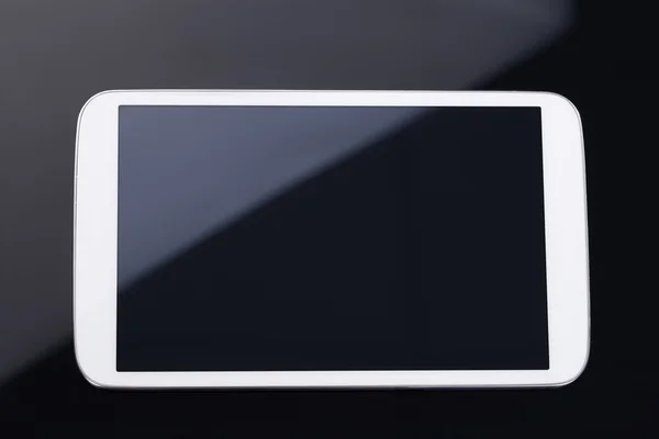 Tablet sobre fundo preto — Fotografia de Stock