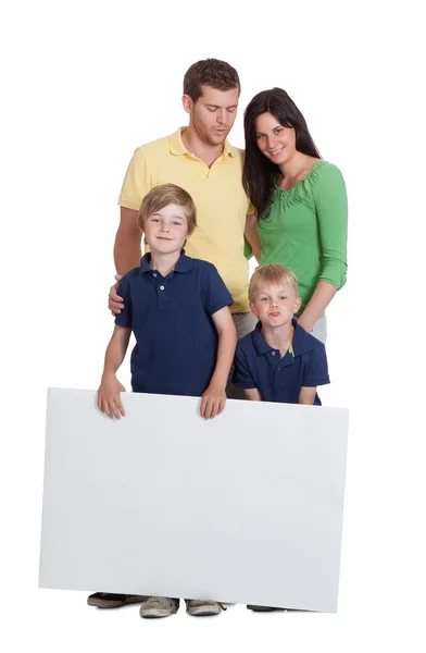 Happy Family Holding Blank Billboard — Stock Photo, Image