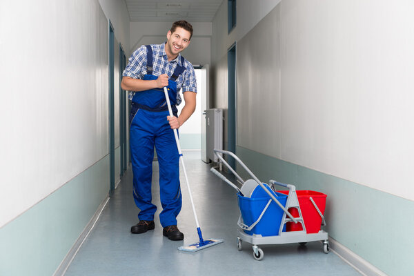 Male Worker With Broom