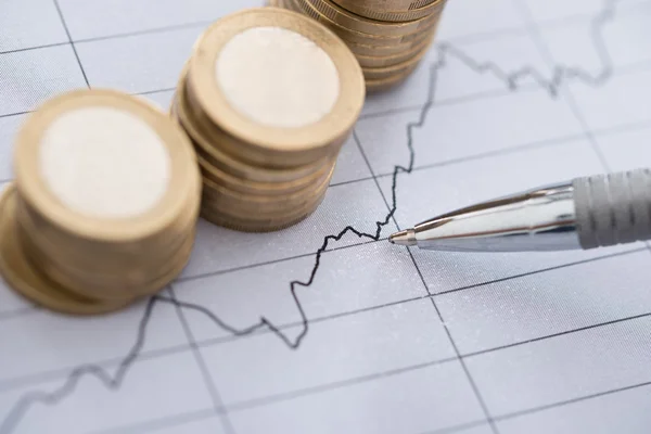 Pen With   Coins Graphs — Stock Photo, Image