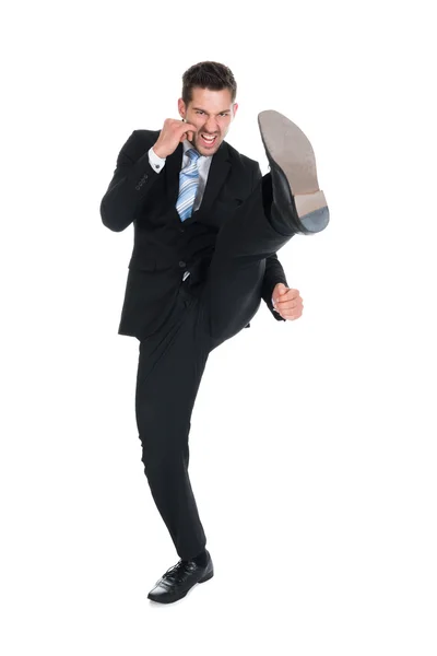 Businessman Kicking — Stock Photo, Image