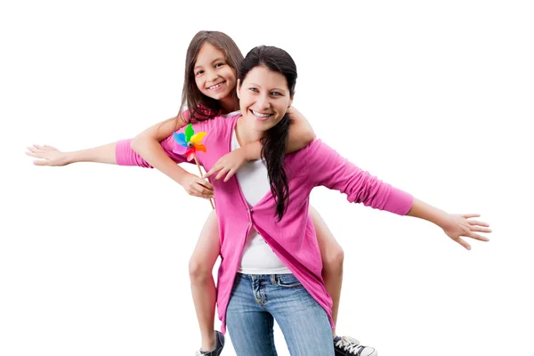 Woman Piggybacking Daughter — Stock Photo, Image