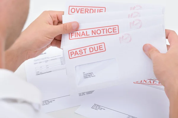 Man Holding Legal Notices — Stock Photo, Image