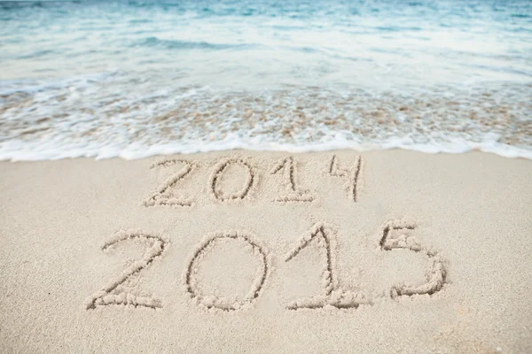 2014 und 2015 auf Sand gezeichnet — Stockfoto