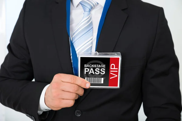 Uomo d'affari con pass per il backstage — Foto Stock