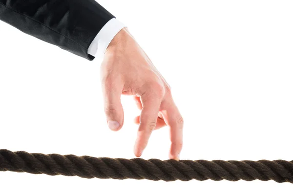 ロープの上を歩くビジネスマンの手 — ストック写真