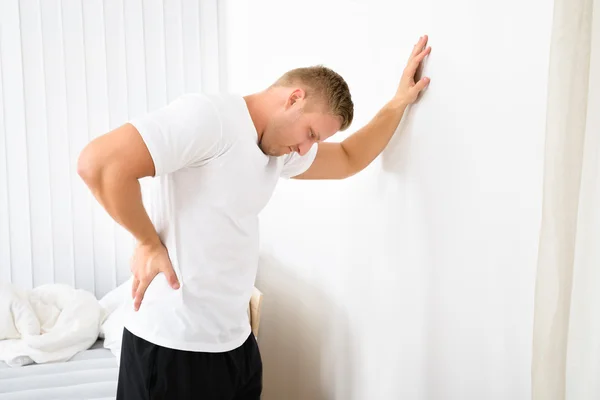 Joven teniendo dolor —  Fotos de Stock