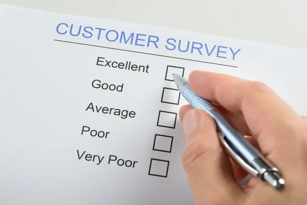 Person Filling Customer Survey Form — Stock Photo, Image